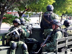 Members of a special unit of the Mexican Army conduct a patrol as part of an operation to increase security after cartel gunmen clashed with federal forces, resulting in the release of Ovidio Guzman from detention, the son of drug kingpin Joaquin "El Chapo" Guzman, in Culiacan, in Sinaloa state, Mexico October 19, 2019.