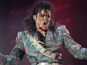 In this Sept. 13, 1992, file photo, Michael Jackson performs during a concert at Vincennes, near Paris.