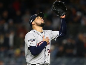 Roberto Osuna of the Houston Astros celebrates after retiring the New York Yankees at Yankee Stadium on October 17, 2019 in New York. (Mike Stobe/Getty Images)