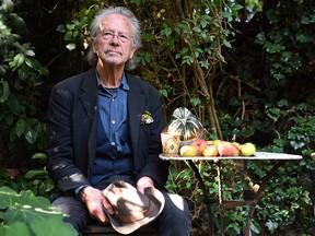 Austrian writer Peter Handke poses in Chaville, in the Paris surburbs, on October 10, 2019 after he was awarded with the 2019 Nobel Literature Prize. (ALAIN JOCARD/AFP via Getty Images)