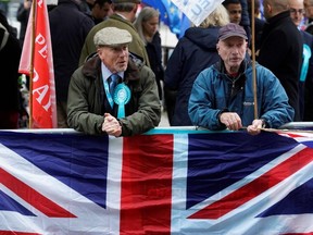 Pro-Brexit demonstrators protest outside Houses of Parliament in London, England, on Monday, Oct. 14, 2019, following the State Opening of Parliament.