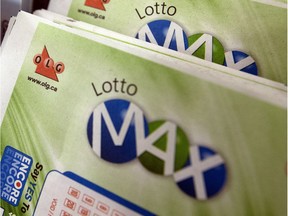 Lotto MAX and Lotto 649 tickets. Theres an unclaimed last week's $64-million 6/49 jackpot on at the OLG headquarters on Tuesday October 27, 2015. Dave Abel/Toronto Sun/Postmedia Network