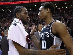 San Antonio Spurs DeMar DeRozan talks to Toronto Raptors Kawhi Leonard after game in Toronto on Saturday Feb. 23, 2019.