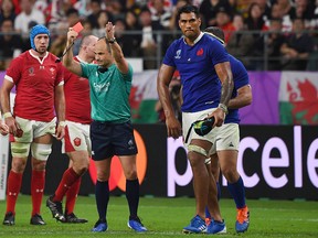 France lock Sebastien Vahaamahina receives a red card from referee Jaco Peyper during the Japan 2019 Rugby World Cup quarterfinal against Wales at the Oita Stadium in Oita on October 20, 2019. (GABRIEL BOUYS/AFP via Getty Images)