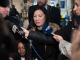 Vanessa Rodel (C) and her daughter, Keana Rodel bottom (L), face the press as  they arrive at Pierre Elliott Trudeau International Airport in Montreal, on March 26, 2019.