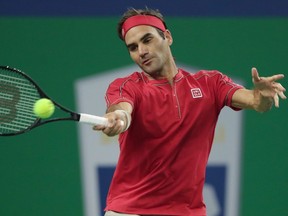Roger Federer in action  against Alexander Zverev during the men's singles quarterfinals match of the Rolex Shanghai Masters at Qi Zhong Tennis Centre in Shanghai, China, on Oct. 11, 2019.