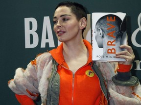 Rose McGowan gets emotional at her book reading for 'Brave' at Barnes & Noble in New York City, on Jan. 31, 2018.