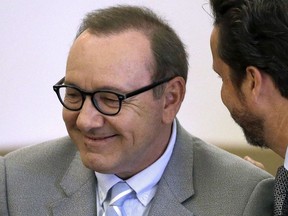 In this June 3, 2019 file photo, actor Kevin Spacey listens to attorney Alan Jackson during a pretrial hearing at district court in Nantucket, Mass.