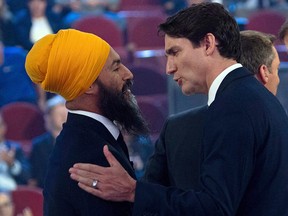 Liberal Leader Justin Trudeau and NDP Lader Jagmeet Singh shake hands following the French language debate at the Canadian Museum of History in Gatineau, Que., on Oct. 10, 2019.