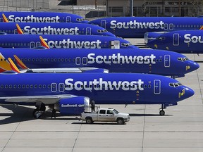 In this file photo taken on March 28, 2019 Southwest Airlines Boeing 737 MAX aircraft are parked on the tarmac after being grounded, at the Southern California Logistics Airport in Victorville, California. (MARK RALSTON/AFP via Getty Images)