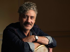 This Sept. 8, 2019 photo shows writer-director-actor Taika Waititi posing for a portrait to promote his film, "Jojo Rabbit," at the Fairmont Royal York Hotel during the Toronto International Film Festival.