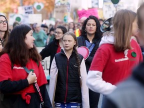 Climate activist Greta Thunberg marches during a climate rally in Vancouver on Friday, Oct. 25, 2019.