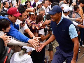 Tiger Woods interacts with fans during The Challenge: Japan Skins at Accordia Golf Narashino Country Club on October 21, 2019 in Inzai, Japan. (Atsushi Tomura/Getty Images)