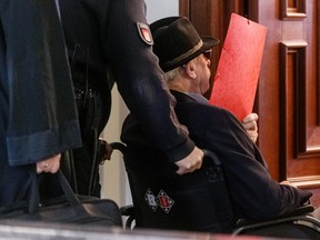 The 93-year-old German Bruno D. leaves the court room after the first day of his trial in Hamburg, Germany, October 17, 2019, accused of being an SS guard and involved in killings between August 1944 and April 1945, helping to murder thousands of prisoners, many of them Jewish, in the Stutthof Nazi concentration camp near Gdansk, Poland. Markus Scholz/Pool via REUTERS