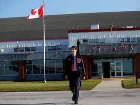 Liberal leader and Canadian Prime Minister Justin Trudeau walks on the tarmac at the airport during an election campaign visit to Ottawa on October 11, 2019. (REUTERS/Stephane Mahe)