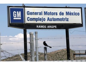 The GM logo is pictured near the General Motors Assembly Plant in Ramos Arizpe, state of Coahuila, Mexico October 7, 2019. REUTERS/Daniel Becerril
