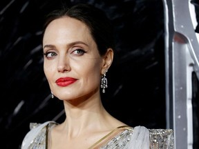 Actor Angelina Jolie poses as she attends the UK premiere of "Maleficent: Mistress of Evil" in London, Britain October 9, 2019.