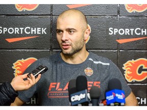 Calgary Flames Captain Mark Giordano provides an update Friday on TJ Brodie, who experienced an episode on-ice at practice yesterday. Photo by Azin Ghaffari/Postmedia.