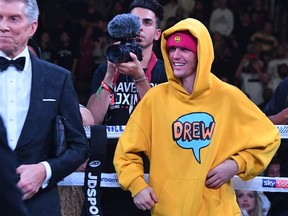 Justin Bieber waits in the ring after the fight between KSI and Logan Paul at Staples Center on November 9, 2019 in Los Angeles, California. KSI won by decision.