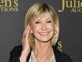 Olivia Newton-John attends the VIP reception for upcoming "Property of Olivia Newton-John Auction Event at Juliens Auctions on October 29, 2019 in Beverly Hills, California.