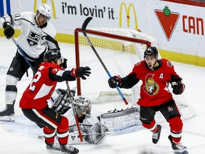 Ottawa Senators Jean-Gabriel Pageau (R) celebrates his game winning overtime goal with Thomas Chabot as Los Angeles Kings Anze Kopitar and goaltender Jack Campbell look on during NHL action at the Canadian Tire Centre on Thursday, Nov. 7, 2019.