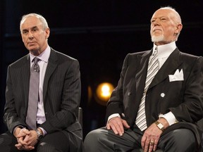 Ron MacLean (left) sits beside Don Cherry as Rogers TV unveils their team for the station's NHL coverage in Toronto on Monday, March 10, 2014. THE CANADIAN PRESS/Chris Young