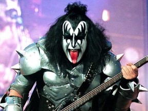 Bass player Gene Simmons of the rock group ''KISS'' performs live, June 27, 2000 at the Continental Airlines Arena in East Rutherford, New Jersey.