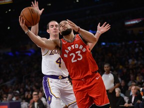 Toronto Raptors guard Fred VanVleet (23) moves to the basket ahead of Los Angeles Lakers guard Alex Caruso (4) during the first half at Staples Center. USA TODAY Sports
