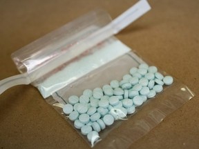 Tablets believed to be laced with fentanyl are displayed at the Drug Enforcement Administration Northeast Regional Laboratory on October 8, 2019 in New York.