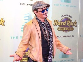 US actor Johnny Depp attends the Grand Opening of the Guitar Hotel expansion at Seminole Hard Rock Hotel & Casino Hollywood, in Hollywood, Florida, October 24, 2019.