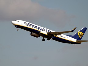In this file photo taken on Sept. 27, 2019 a Boeing 737 NG / Max of Irish low cost company Ryanair flies after taking off from the Toulouse-Blagnac airport, near Toulouse. (PASCAL PAVANI/AFP via Getty Images)