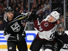 Alec Martinez of the Los Angeles Kings pushes Mikko Rantanen of the Colorado Avalanche at Staples Center on December 21, 2017 in Los Angeles. (Sean M. Haffey/Getty Images)