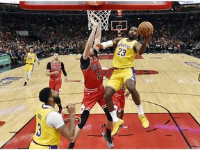 Los Angeles Lakers forward LeBron James shoots a layup in the first half against Chicago Bulls forward Luke Kornet at United Center.