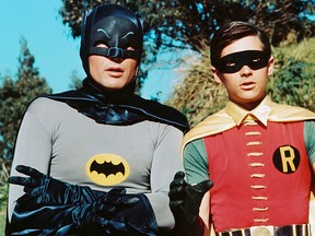 American actors Adam West as Bruce Wayne/Batman and Burt Ward as Dick Grayson/Robin in the TV series 'Batman', circa 1966. (Silver Screen Collection/Hulton Archive/Getty Images)