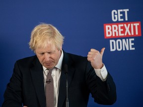 Prime Minister Boris Johnson speaks at a press conference alongside cabinet minister Michael Gove and former Labour Party MP Gisela Stuart on November 29, 2019 in London. (Chris J Ratcliffe/Getty Images)