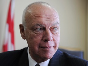 Sen. Jean-Guy Dagenais poses for a photo in his office in Ottawa Feb 21, 2012.