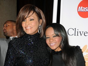 Singer Whitney Houston and Bobbi Kristina Brown arrives at the 2011 Pre-GRAMMY Gala and Salute To Industry Icons Honoring David Geffen at Beverly Hilton on February 12, 2011 in Beverly Hills, California.  (Jason Merritt/Getty Images)