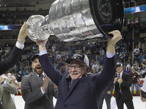 General manager Jim Rutherford holds up the Stanley Cup after his Penguins knocked off the San Jose Sharks in Game 6 three years ago. Rutherford has been GM of three Cup-winners, two in Pittsburgh and one in Carolina.