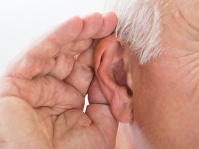 Close-up Of A Man Trying To Hear