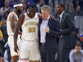 Draymond Green of the Golden State Warriors talks to head coach Steve Kerr during their game against the San Antonio Spurs at Chase Center on Nov. 1, 2019, in San Francisco, Calif.