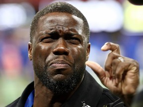 In this Feb. 3, 2019, file photo, Kevin Hart attends Super Bowl LIII between the New England Patriots and the Los Angeles Rams at Mercedes-Benz Stadium in Atlanta, Ga.