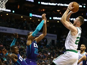 Boston Celtics forward Gordon Hayward shoots the ball against Charlotte Hornets forward PJ Washington in the second half at Spectrum Center in Charlotte, N.C., on Nov, 7, 2019.