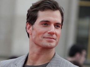 British actor Henry Cavill poses on the red carpet as he arrives to attend the world premiere of his new film Mission: Impossible Fallout at the Theatre de Chaillot in Paris, on July 12, 2018.