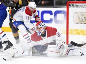 Montreal Canadiens goaltender Keith Kinkaid bats the puck away from the net during the second period against the Golden Knights in Las Vegas on Oct. 31, 2019.