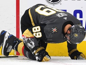 Nov 2, 2019; Las Vegas, NV, USA; Vegas Golden Knights right wing Alex Tuch (89) reacts after an apparent injury during the second period against the Winnipeg Jets at T-Mobile Arena. Mandatory Credit: Stephen R. Sylvanie-USA TODAY Sports