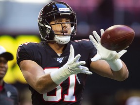 In this Oct. 27, 2019, file photo, Austin Hooper of the Atlanta Falcons catches a pass prior to the start of the game against the Seattle Seahawks at Mercedes-Benz Stadium in Atlanta, Ga.