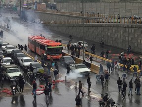 People protest against increased gas price, on a highway in Tehran, Iran November 16, 2019. (Nazanin Tabatabaee/WANA (West Asia News Agency) via REUTERS)