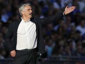 In this file photo taken on May 19, 2018 Manchester United manager Jose Mourinho gestures from the touchline during the English FA Cup final against Chelsea at Wembley stadium in London. (IAN KINGTON/AFP via Getty Images)