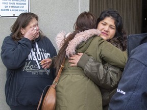 Brittany Chrisjohn is hugged by a supporter outside of the courthouse in London, Ont. on Friday November 1, 2019. London police Const. Nicholas Doering was found guilty criminal negligence causing death and failing to provide the necessities of life in the 2016 death of Brittany's sister Debra Chrisjohn.