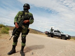 A soldier assigned to the National Guard is pictured at a checkpoint as part of an ongoing security operation by the federal government near the Mexican-American Mormon community of La Mora, Sonora state, Mexico November 6, 2019.